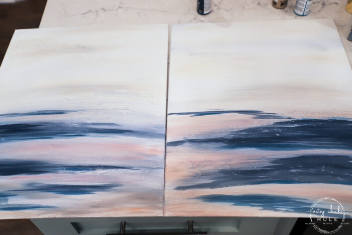 Both canvases with with paint that has been blended