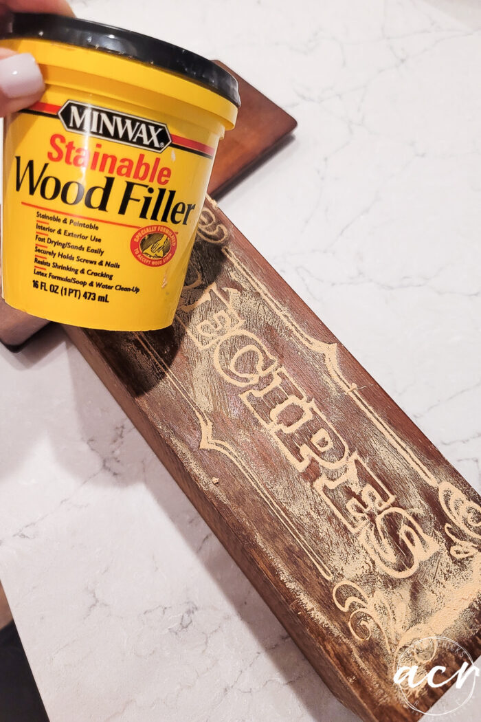 wood filler on the recipe box filling in the design