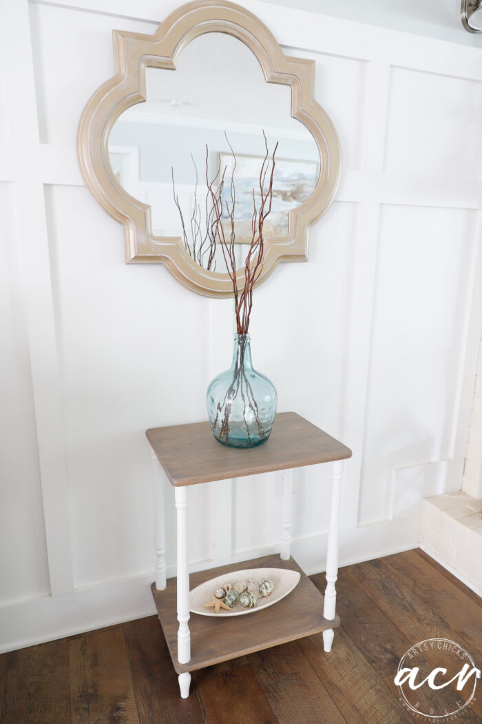 gold mirror with driftwood table and white legs