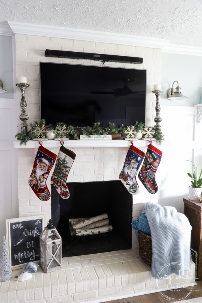 Create a cozy Christmas living room (and home) with sweet, sentimental touches, pops of red, cozy throws, and pillows!