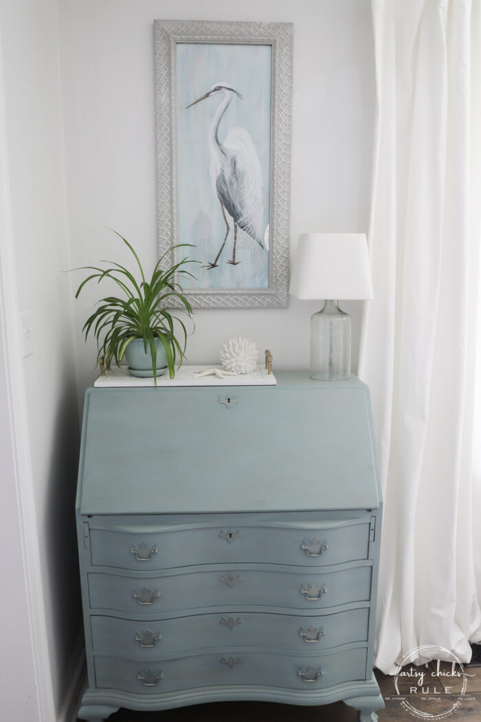 blue heron framed on blue secretary