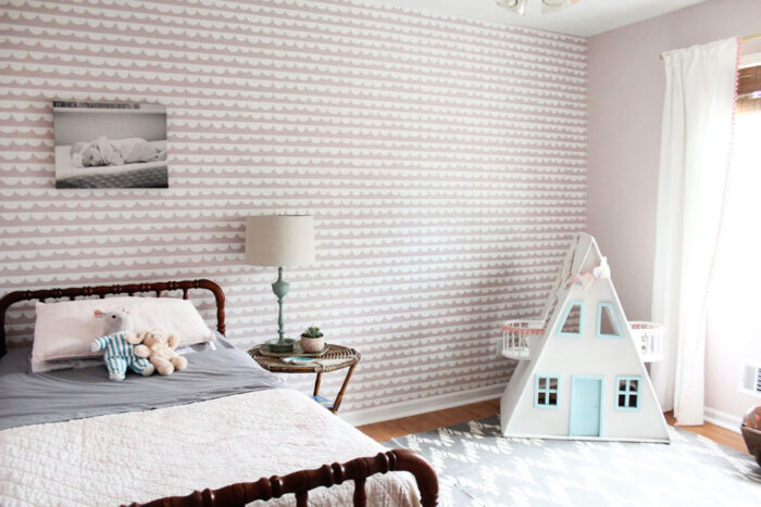 soft pink and white lined wallpaper girl's room