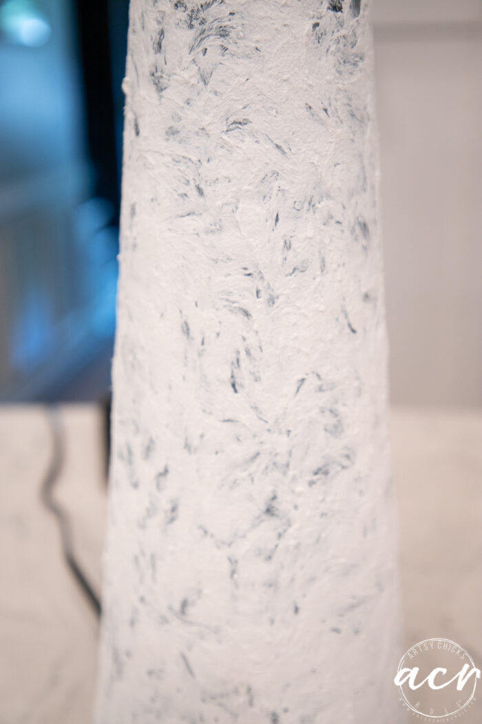 white fiber paste to add a faux stone look on lamp