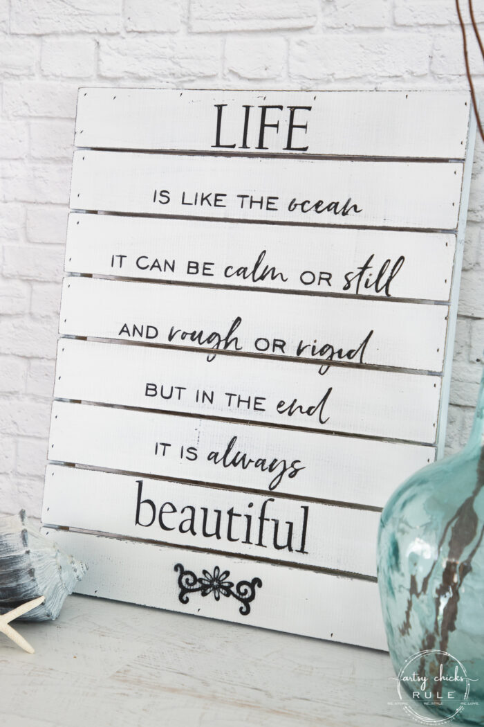 finished life is like the ocean sign on white brick wall