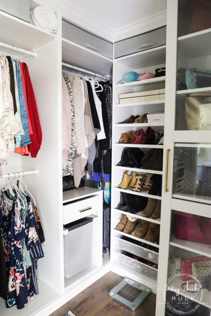 We created a "custom, built-in" master closet look with basic IKEA PAX closet system cabinets simply by adding trim and a few extra touches! artsychicksrule.com #builtincloset #ikeapax #paxclosethack #ikeapaxideas