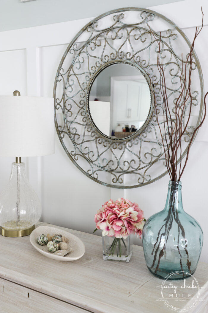Sometimes all it needs is a little paint for a brand look and life. This simple metal mirror makeover is one anyone can do! artsychicksrule.com #metalmirror #scrollmirror