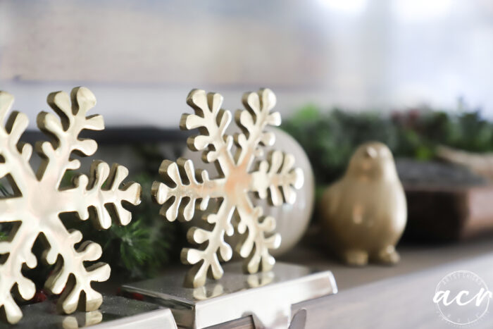 up close shot of gold snowflake stocking holders