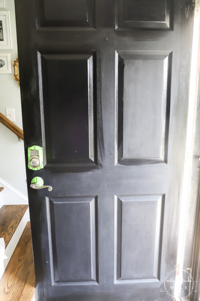 full black door with paint in the box
