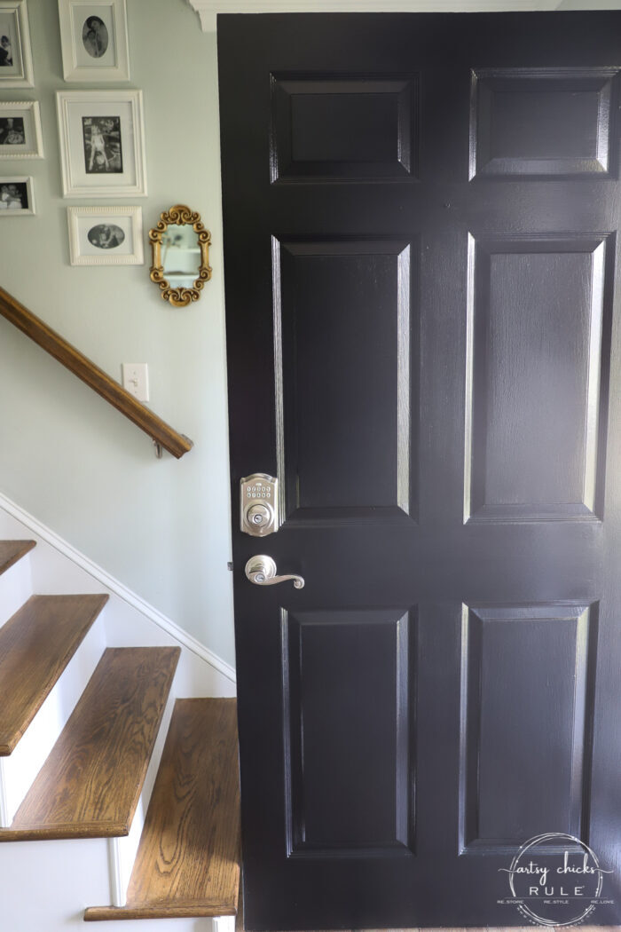 black painted front door open