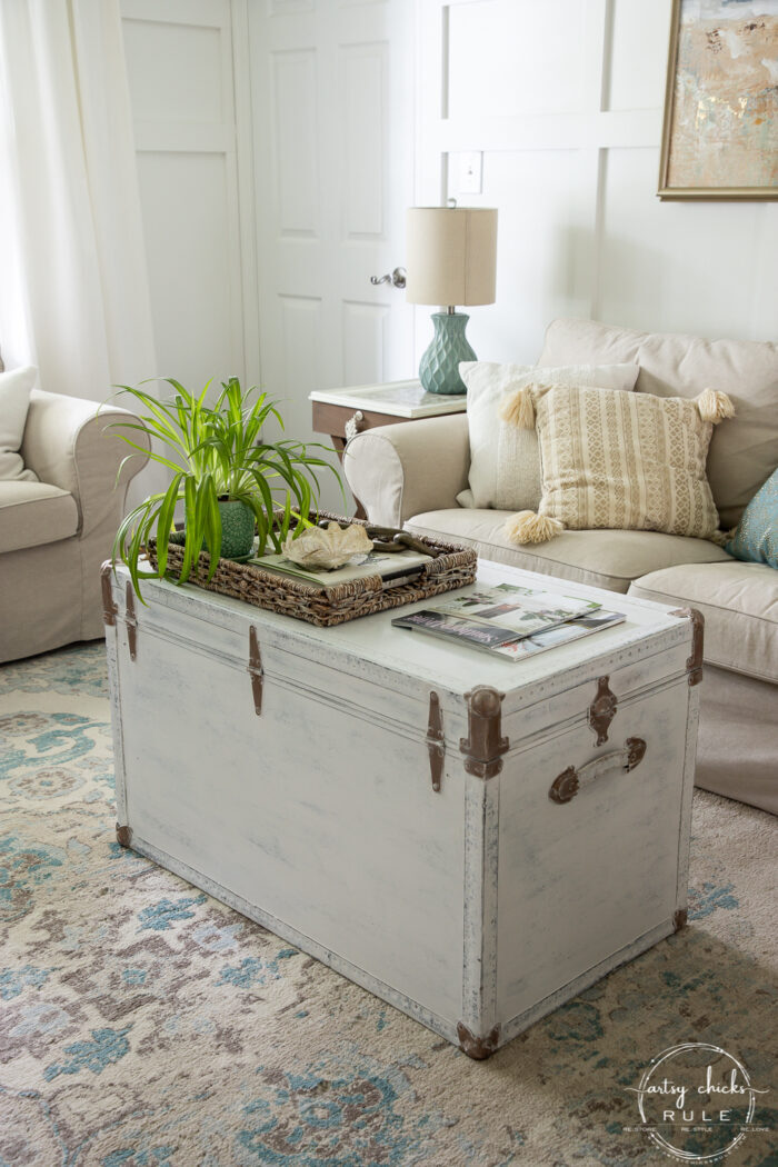 styled white trunk with couch