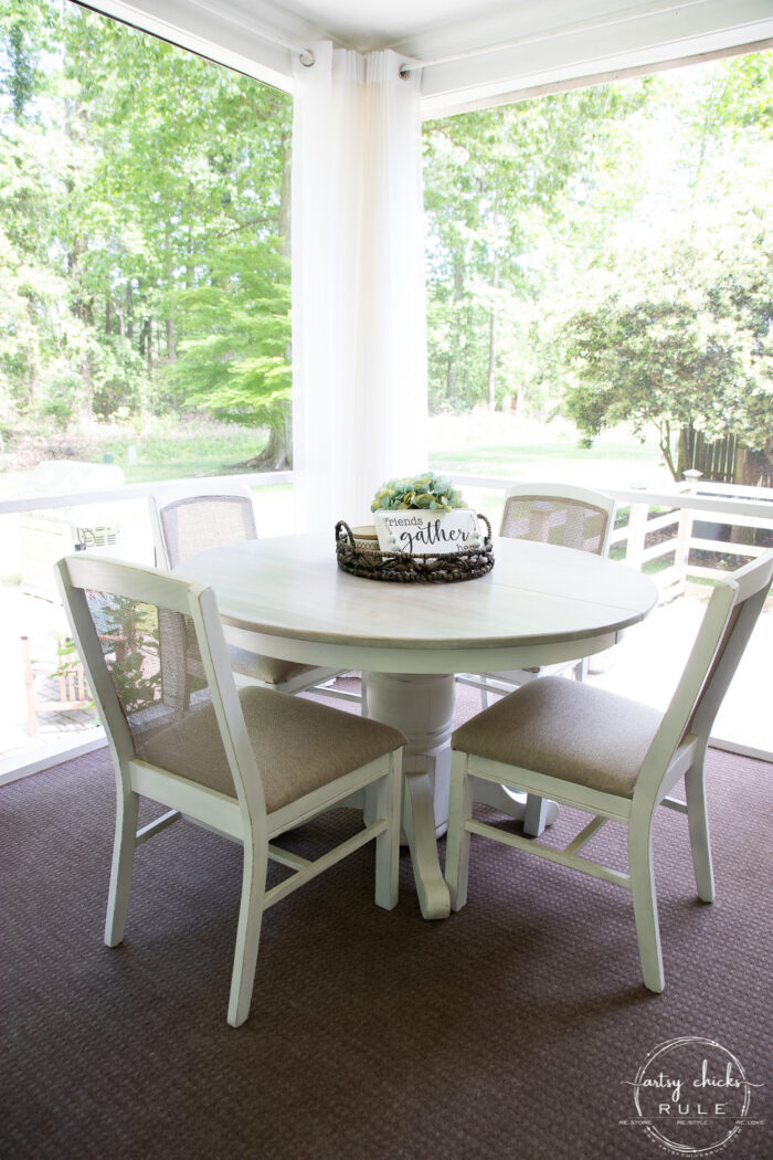 bleached wood tabletop with brown and white chairs