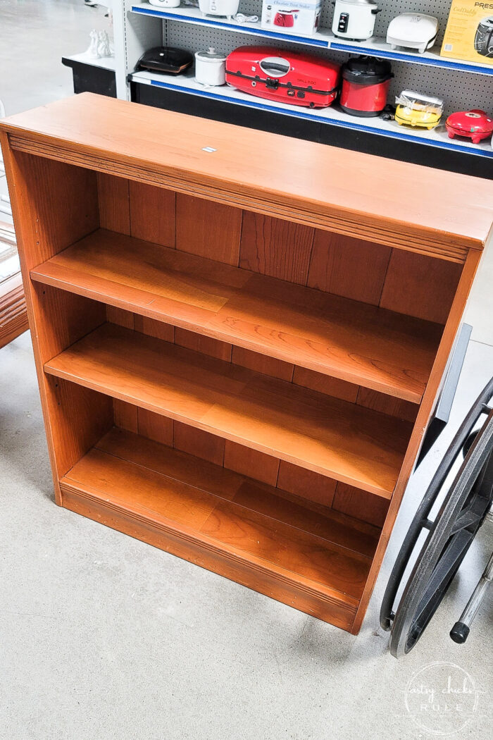 orangey solid wood shelf